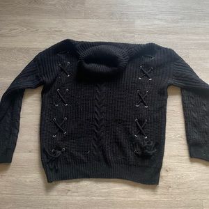 Pink Diamond black sweater